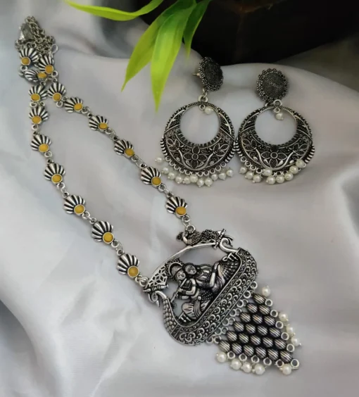 Glamaya Oxidized Long Radha Krishna Stone Temple Necklace Earring Set 4 GLAM-CN-ST-22-052211-35-5 Glamaya Oxidized Long Radha Krishna Stone Temple Necklace Earring Set 4 GLAM-CN-ST-22-052211-35-5