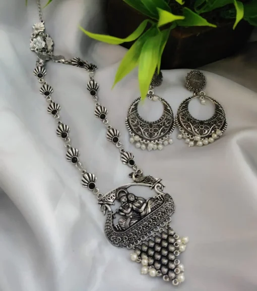 Glamaya Oxidized Long Radha Krishna Stone Temple Necklace Earring Set 2 GLAM-CN-ST-22-052211-35-5 Glamaya Oxidized Long Radha Krishna Stone Temple Necklace Earring Set 2 GLAM-CN-ST-22-052211-35-5