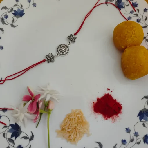 Exquisite Oxidised Butterfly Rakhi & Bracelet Set