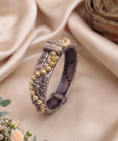 silver replica dual tone screw openable sunbrust bangle glamaya